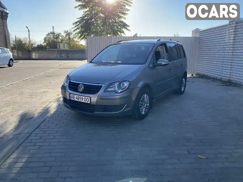 Мінівен Volkswagen Touran 2009 1.39 л. Автомат обл. Дніпропетровська, Дніпро (Дніпропетровськ) - Фото 1/21