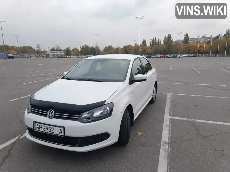 Седан Volkswagen Polo 2012 1.6 л. Ручная / Механика обл. Днепропетровская, Днепр (Днепропетровск) - Фото 1/21