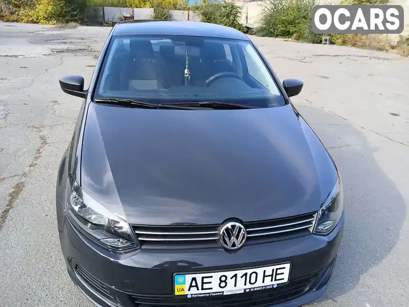 Седан Volkswagen Polo 2013 1.6 л. Ручна / Механіка обл. Дніпропетровська, Дніпро (Дніпропетровськ) - Фото 1/10