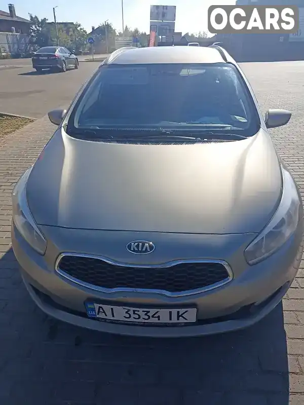 Універсал Kia Ceed 2013 1.6 л. Ручна / Механіка обл. Київська, Вишневе - Фото 1/10