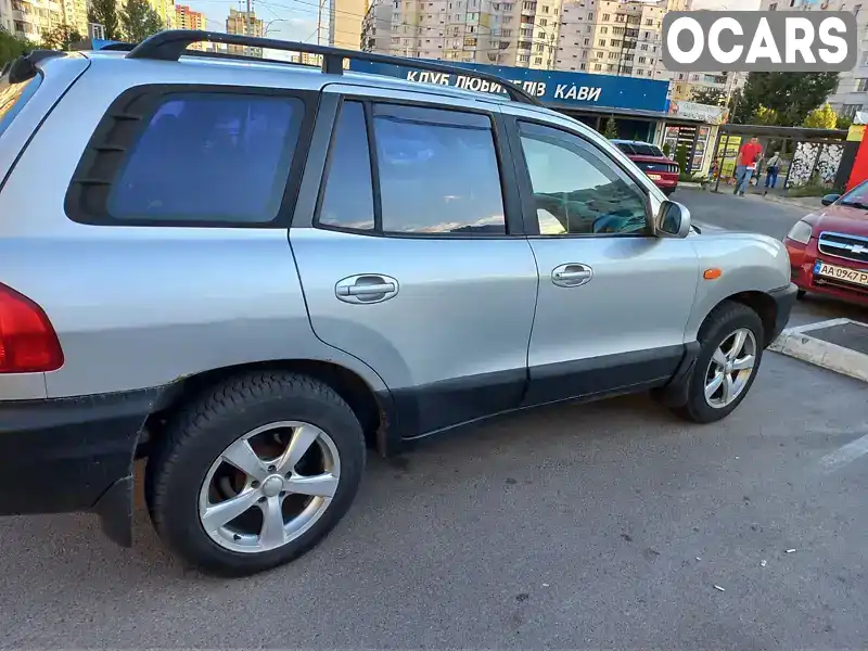 KMHSC81DP1U047028 Hyundai Santa FE 2001 Позашляховик / Кросовер 2.66 л. Фото 7