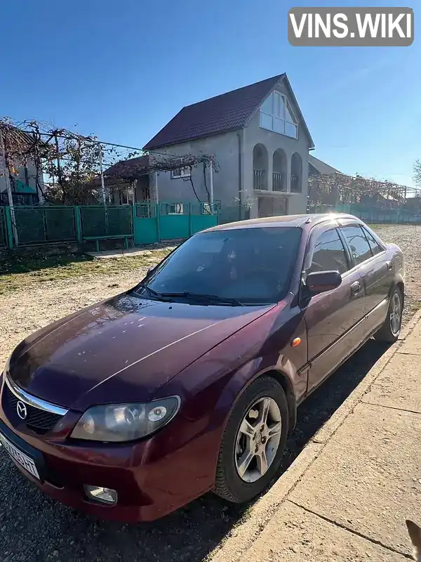 Седан Mazda 323 2003 null_content л. Ручна / Механіка обл. Закарпатська, location.city.siltse - Фото 1/14