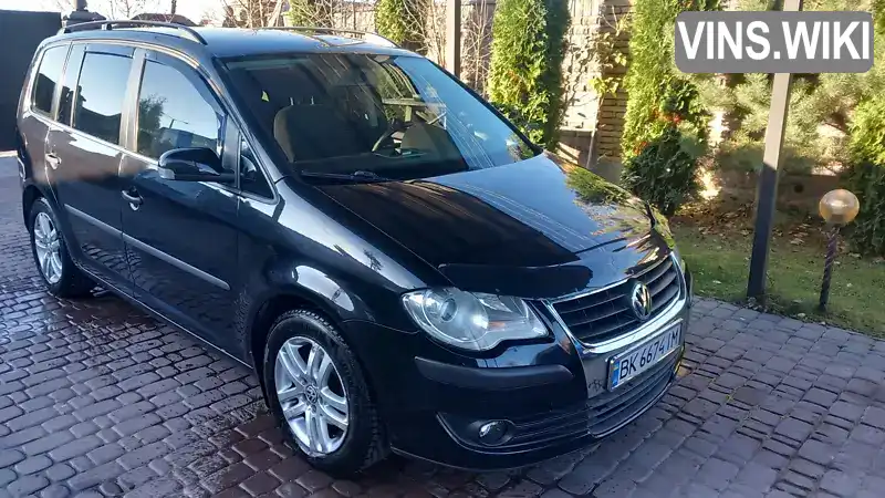 Мінівен Volkswagen Touran 2008 1.9 л. Ручна / Механіка обл. Рівненська, Рівне - Фото 1/21