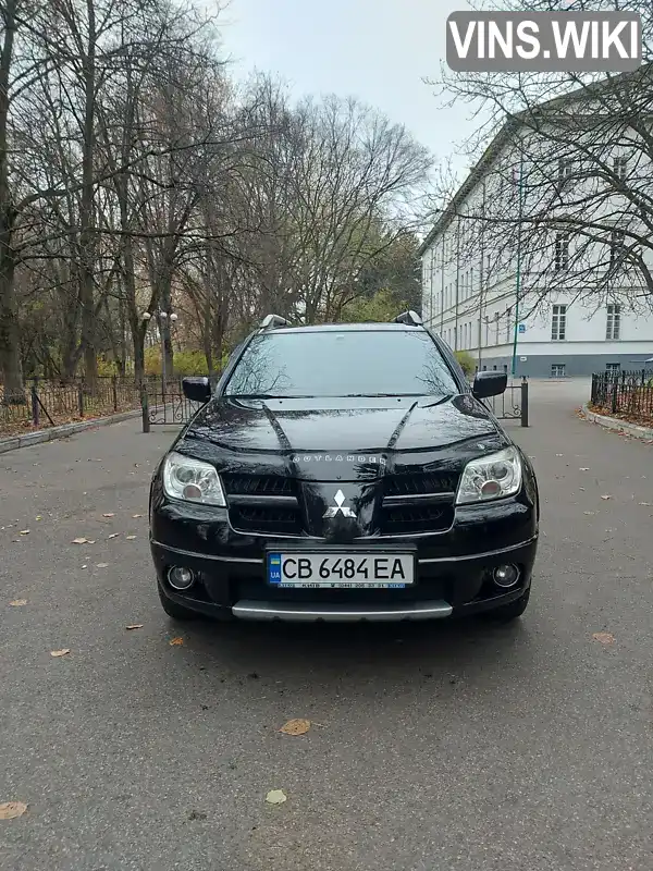 Внедорожник / Кроссовер Mitsubishi Outlander 2008 2.4 л. Автомат обл. Черниговская, Нежин - Фото 1/17