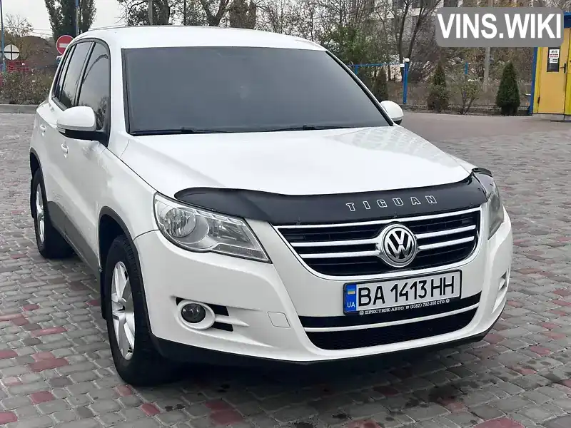 Позашляховик / Кросовер Volkswagen Tiguan 2010 1.4 л. Ручна / Механіка обл. Київська, Вишневе - Фото 1/21