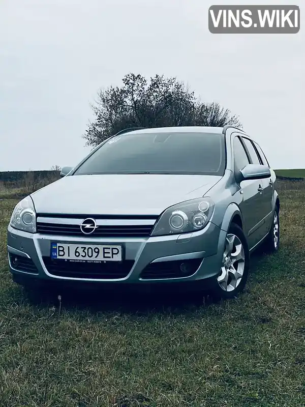 W0L0AHL3552172966 Opel Astra 2005 Универсал 1.8 л. Фото 2