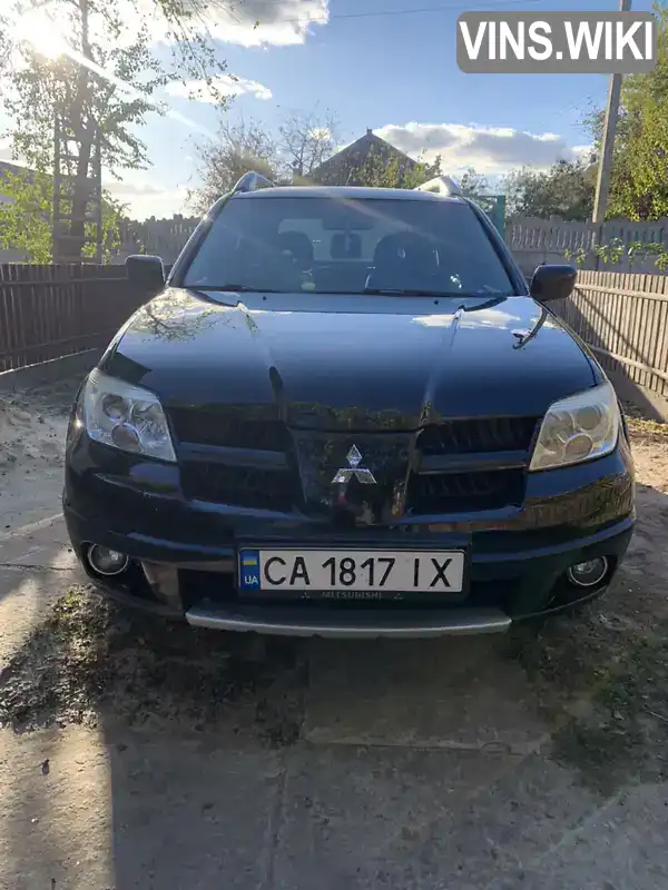 Позашляховик / Кросовер Mitsubishi Outlander 2008 2.4 л. Автомат обл. Черкаська, Черкаси - Фото 1/21