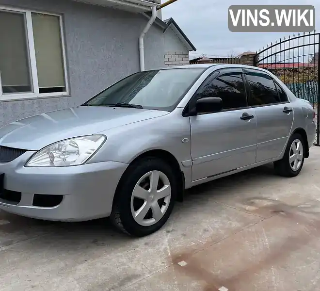 Седан Mitsubishi Lancer 2005 1.6 л. Ручна / Механіка обл. Миколаївська, Первомайськ - Фото 1/21