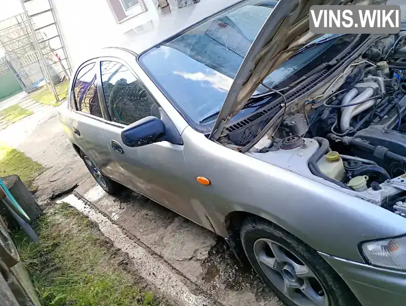 Седан Mazda 323 1998 1.5 л. Ручна / Механіка обл. Івано-Франківська, Івано-Франківськ - Фото 1/8