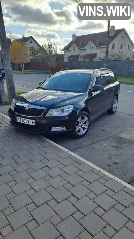 Універсал Skoda Octavia 2009 1.6 л. Ручна / Механіка обл. Київська, Вишневе - Фото 1/16