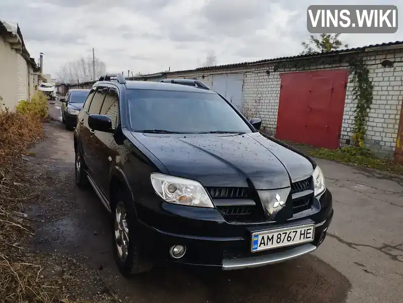 Позашляховик / Кросовер Mitsubishi Outlander 2009 2 л. Ручна / Механіка обл. Житомирська, Житомир - Фото 1/20