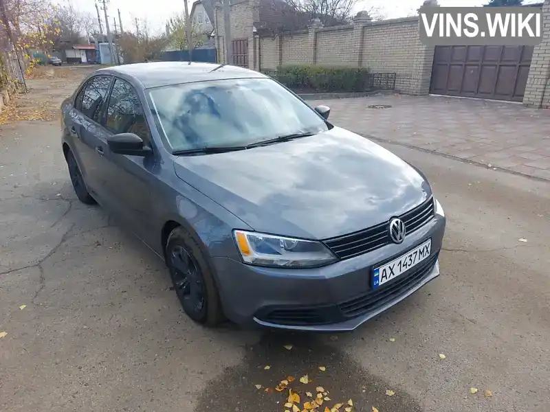 Седан Volkswagen Jetta 2013 2 л. обл. Харківська, Люботин - Фото 1/11