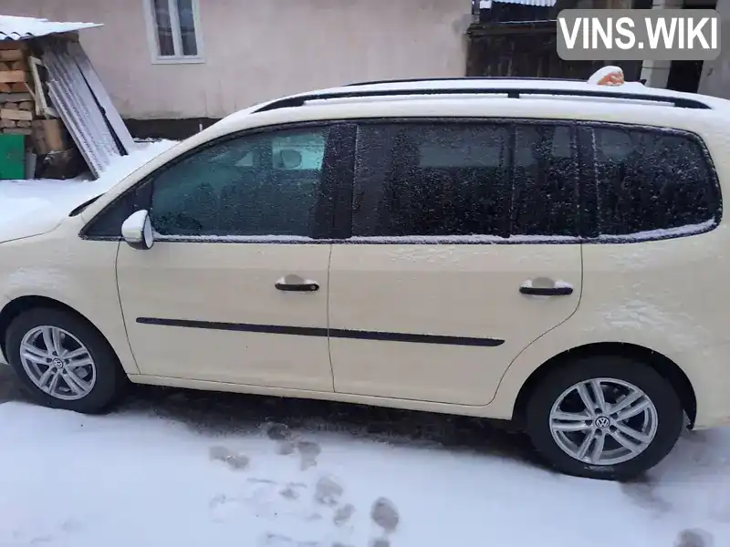 Мінівен Volkswagen Touran 2012 1.6 л. обл. Закарпатська, Рахів - Фото 1/11