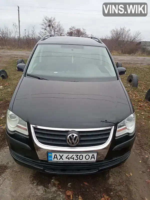 Мінівен Volkswagen Touran 2008 1.4 л. Ручна / Механіка обл. Харківська, Харків - Фото 1/19