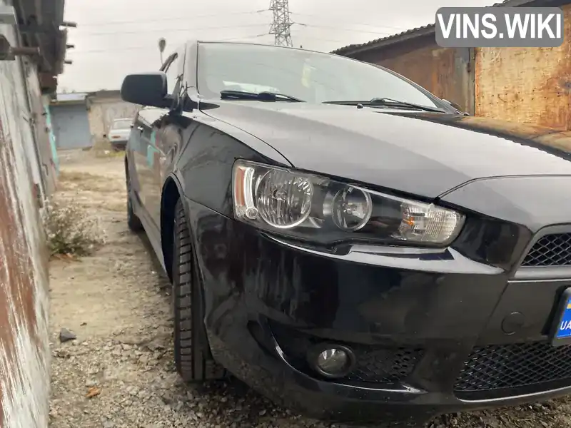 Седан Mitsubishi Lancer 2010 2 л. Автомат обл. Харківська, Харків - Фото 1/15