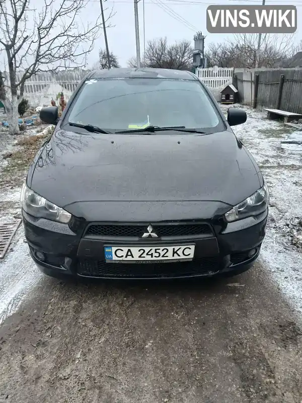 Седан Mitsubishi Lancer 2009 2 л. Автомат обл. Черкасская, Смела - Фото 1/18