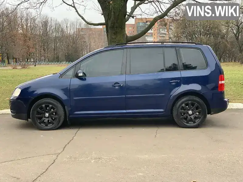 Мінівен Volkswagen Touran 2003 1.6 л. Автомат обл. Рівненська, Рівне - Фото 1/21