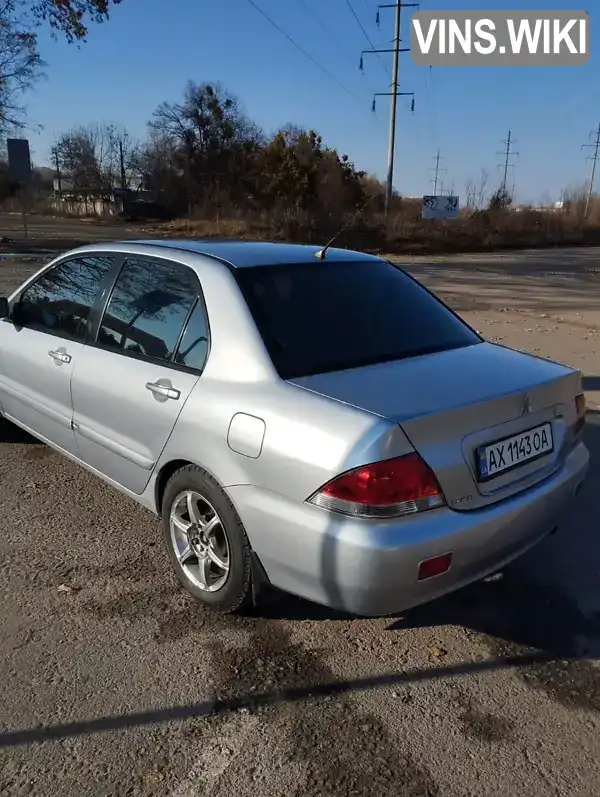 Седан Mitsubishi Lancer 2005 1.58 л. Ручная / Механика обл. Полтавская, Полтава - Фото 1/12