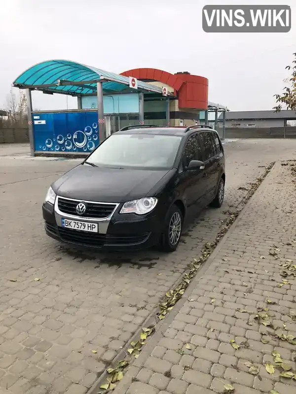 Мінівен Volkswagen Touran 2008 1.9 л. Автомат обл. Рівненська, Вараш (Кузнецовськ) - Фото 1/11