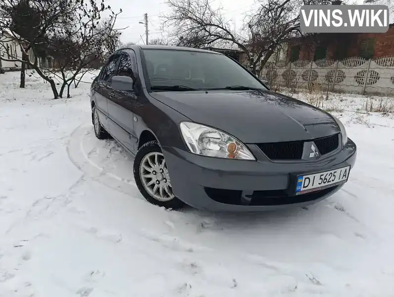 Седан Mitsubishi Lancer 2009 1.58 л. Ручна / Механіка обл. Харківська, Харків - Фото 1/15