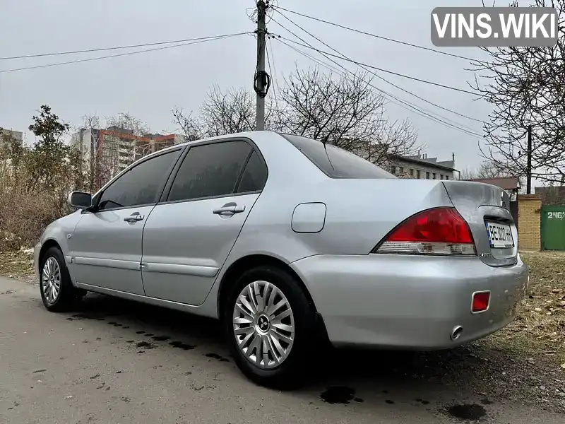 Седан Mitsubishi Lancer 2009 1.6 л. Ручна / Механіка обл. Миколаївська, Миколаїв - Фото 1/21