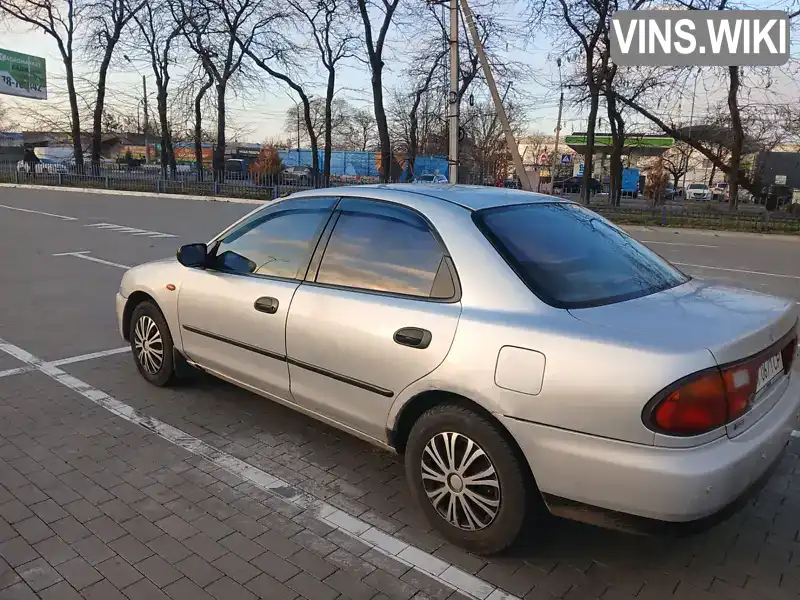 Седан Mazda 323 1996 null_content л. обл. Одеська, Одеса - Фото 1/21