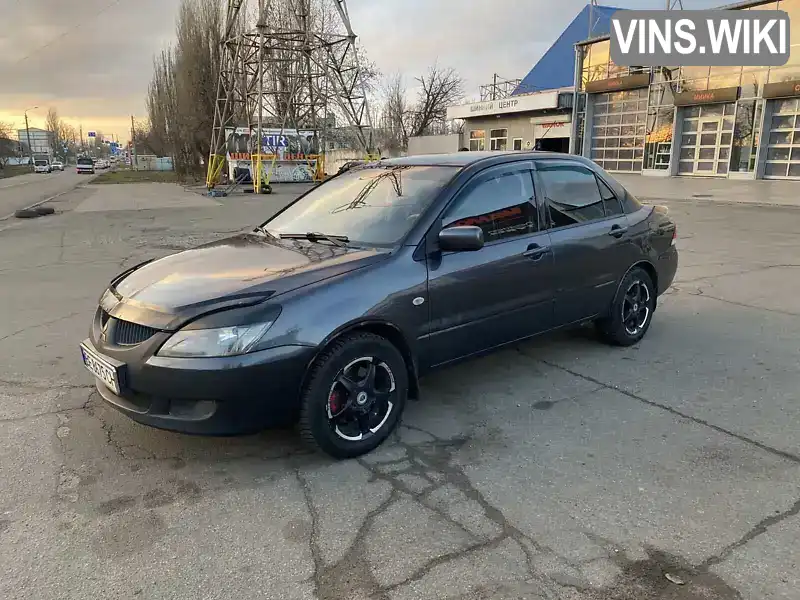 Седан Mitsubishi Lancer 2003 1.59 л. Ручна / Механіка обл. Миколаївська, Миколаїв - Фото 1/21