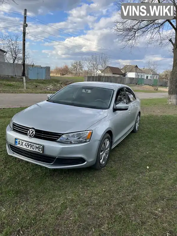 Седан Volkswagen Jetta 2013 1.8 л. Автомат обл. Харьковская, Харьков - Фото 1/7