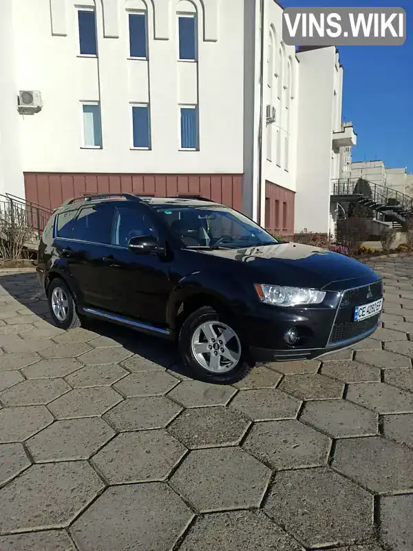 Внедорожник / Кроссовер Mitsubishi Outlander 2011 2.3 л. Ручная / Механика обл. Черновицкая, Черновцы - Фото 1/21