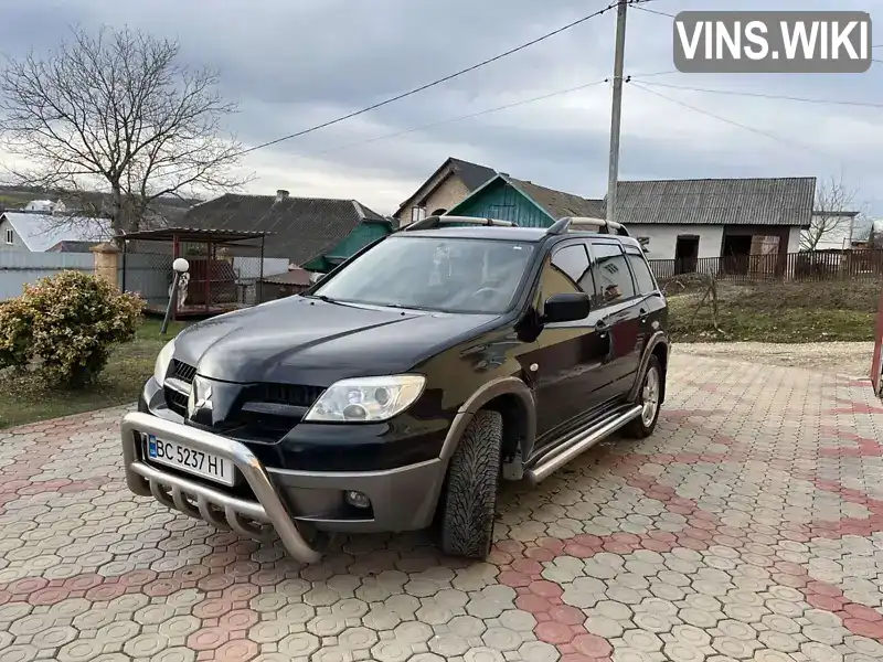 Позашляховик / Кросовер Mitsubishi Outlander 2005 2.38 л. Автомат обл. Львівська, Самбір - Фото 1/21