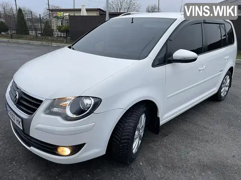 Мінівен Volkswagen Touran 2010 1.97 л. Ручна / Механіка обл. Житомирська, Звягель - Фото 1/21