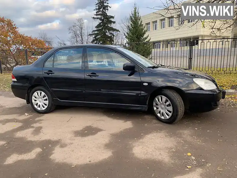 Седан Mitsubishi Lancer 2006 1.58 л. Автомат обл. Харківська, Харків - Фото 1/21