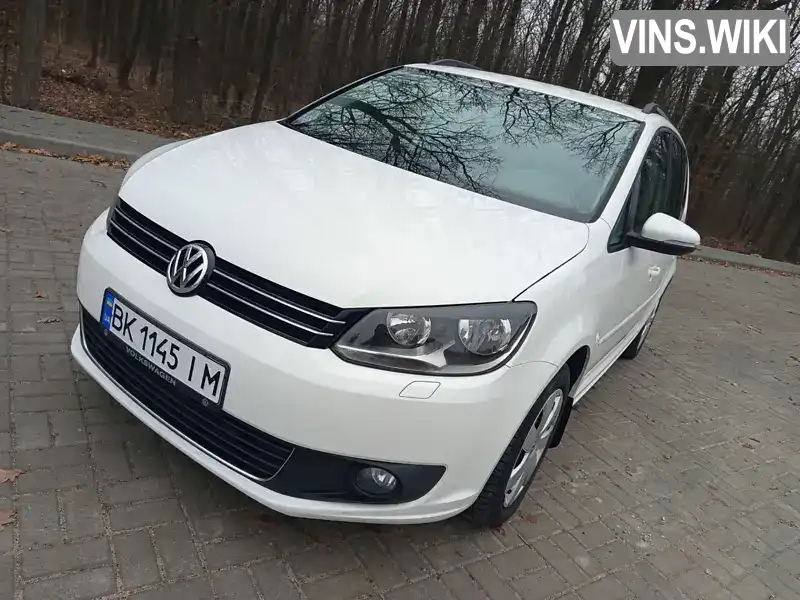 Мінівен Volkswagen Touran 2013 1.97 л. Ручна / Механіка обл. Вінницька, Хмільник - Фото 1/21