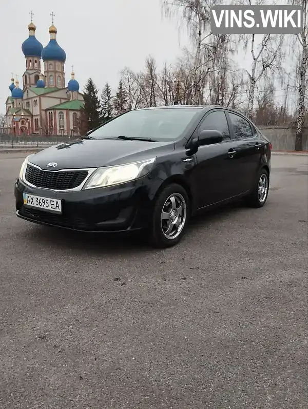 Седан Kia Rio 2013 1.4 л. Ручна / Механіка обл. Харківська, Первомайський - Фото 1/21