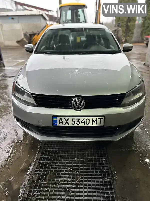 Седан Volkswagen Jetta 2014 1.8 л. Автомат обл. Харківська, Харків - Фото 1/15