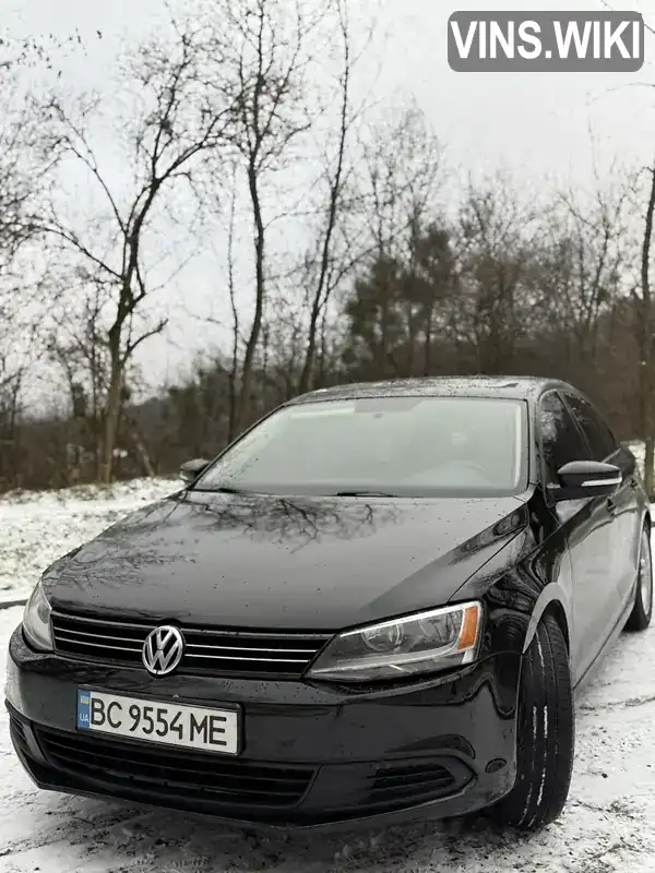 Седан Volkswagen Jetta 2011 2.47 л. Автомат обл. Львівська, Львів - Фото 1/13