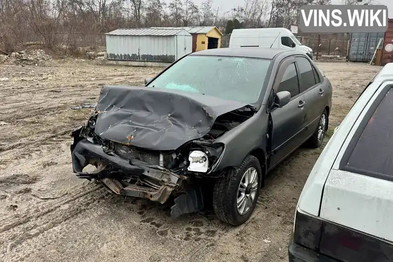 Седан Mitsubishi Lancer 2008 1.6 л. Ручна / Механіка обл. Київська, Київ - Фото 1/21