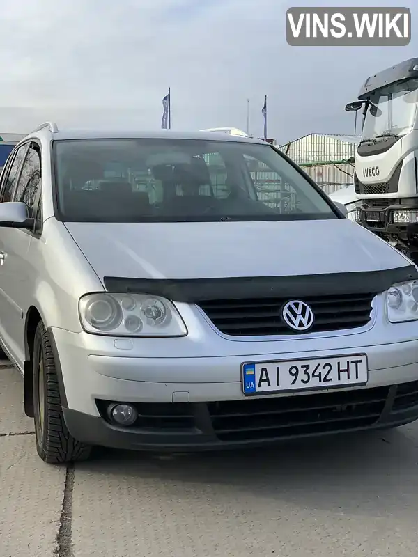 Минивэн Volkswagen Touran 2006 1.4 л. Ручная / Механика обл. Киевская, Борисполь - Фото 1/21