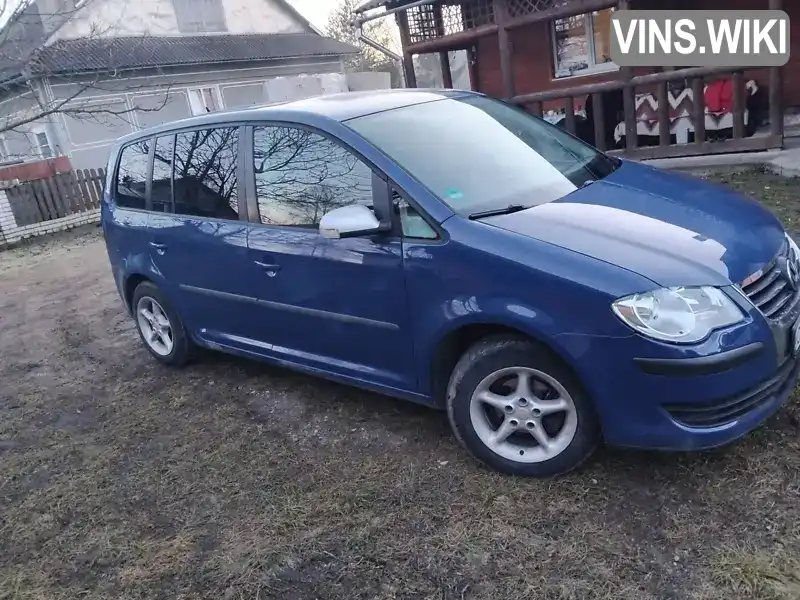 Минивэн Volkswagen Touran 2010 1.4 л. Ручная / Механика обл. Черновицкая, Выжница - Фото 1/8