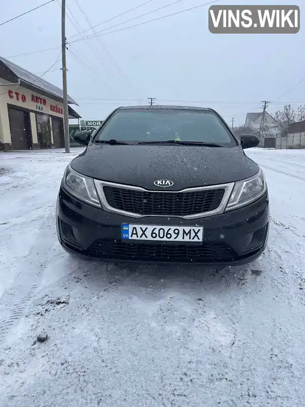 Седан Kia Rio 2014 1.4 л. Автомат обл. Харьковская, Новая Водолага - Фото 1/8