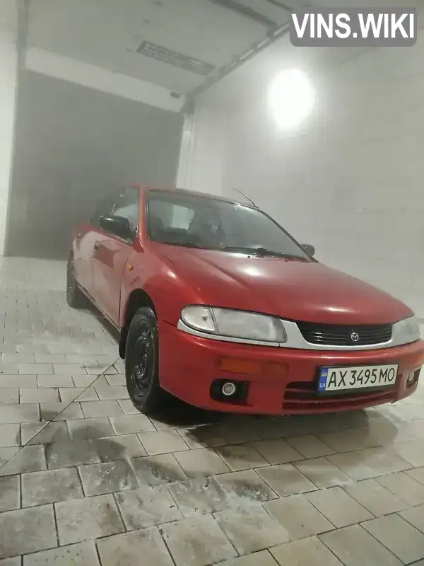 Седан Mazda 323 1995 1.3 л. Ручна / Механіка обл. Харківська, Первомайський - Фото 1/9