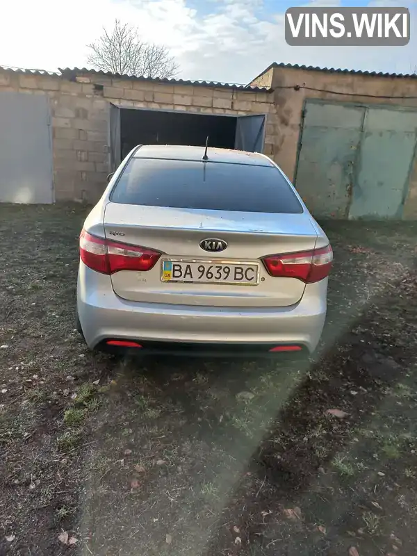 Седан Kia Rio 2013 1.4 л. Ручна / Механіка обл. Кіровоградська, Гайворон - Фото 1/11