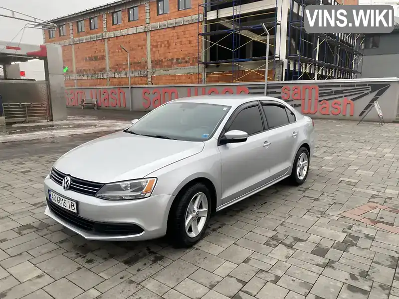 Седан Volkswagen Jetta 2013 1.8 л. Автомат обл. Закарпатська, Ужгород - Фото 1/21