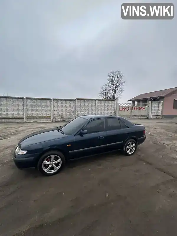 Седан Mazda 626 1998 2 л. обл. Харківська, Чугуїв - Фото 1/10