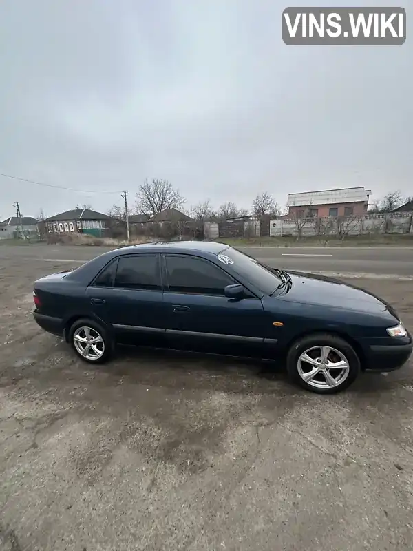 JMZGF12F501162783 Mazda 626 1998 Седан 2 л. Фото 4