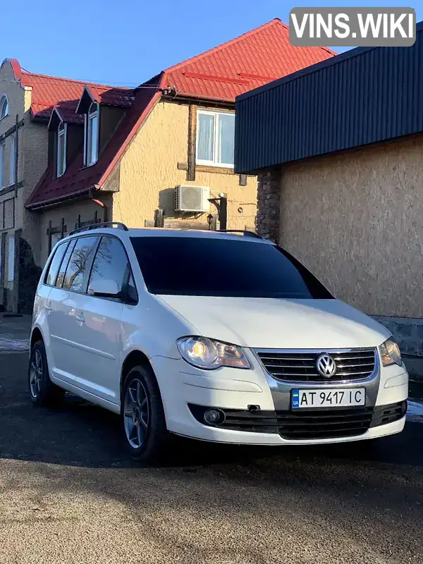 Мінівен Volkswagen Touran 2007 1.97 л. Ручна / Механіка обл. Хмельницька, Кам'янець-Подільський - Фото 1/21