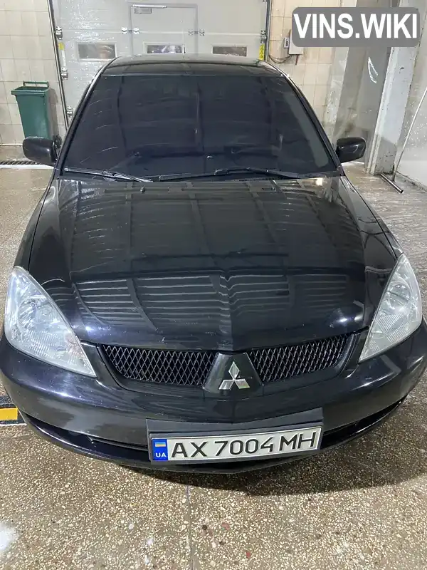 Седан Mitsubishi Lancer 2007 1.58 л. Ручна / Механіка обл. Харківська, Харків - Фото 1/21