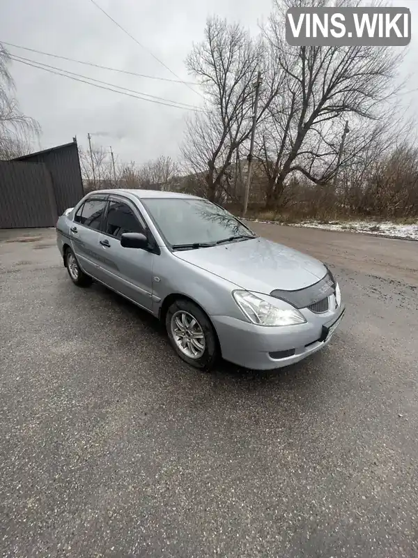 Седан Mitsubishi Lancer 2005 1.58 л. Ручна / Механіка обл. Чернігівська, Прилуки - Фото 1/17