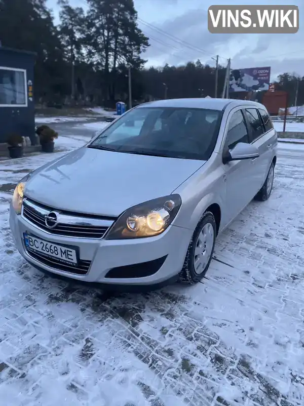 W0L0AHL35A2102456 Opel Astra 2010 Универсал 1.69 л. Фото 1