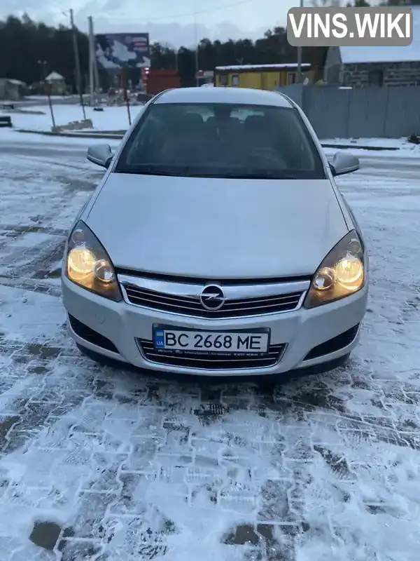 W0L0AHL35A2102456 Opel Astra 2010 Универсал 1.69 л. Фото 2